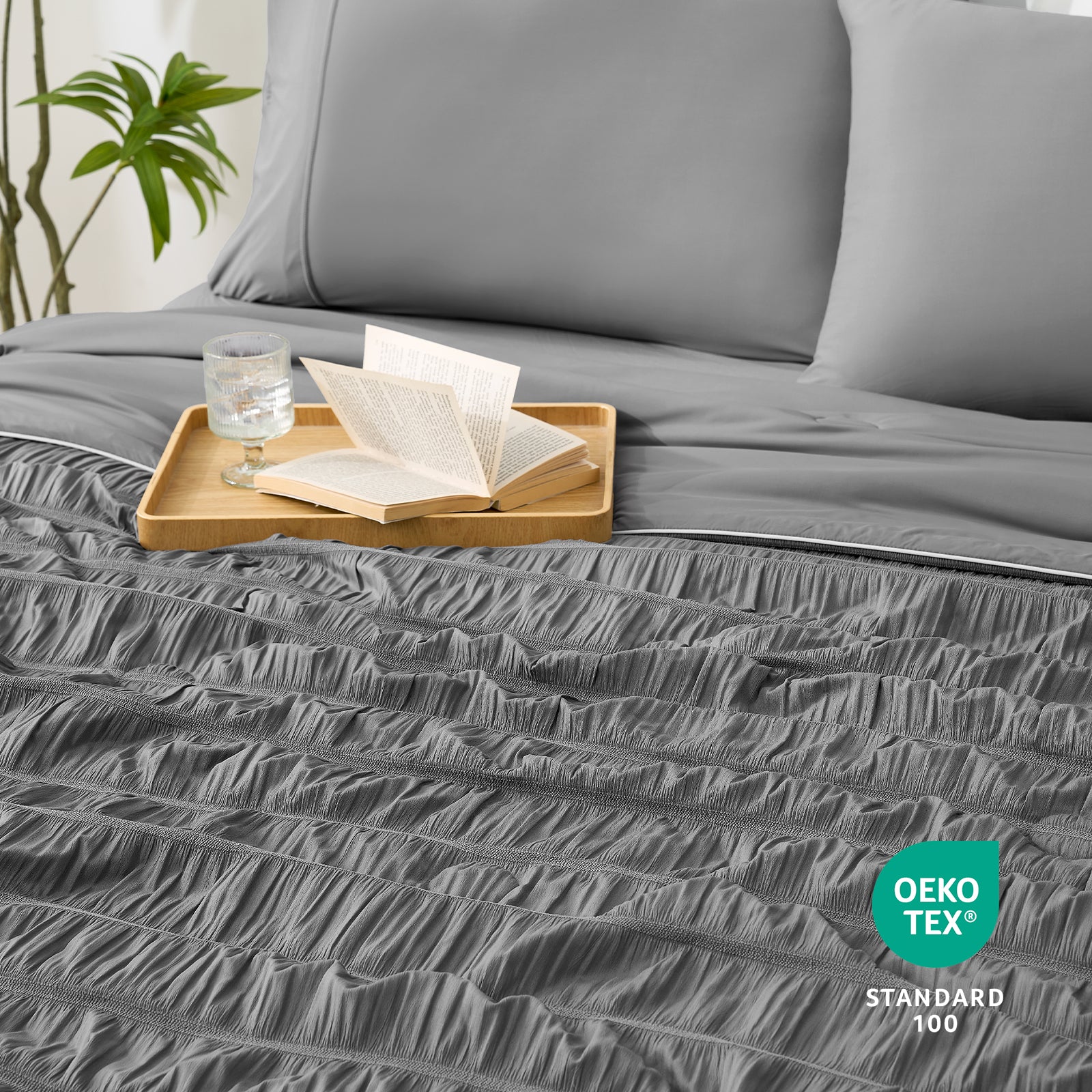 Cozy Bliss dark grey Vertical Striped Seersucker Cooling Comforter featuring Oeko-Tex Standard 100 logo. #color_Charcoal Grey