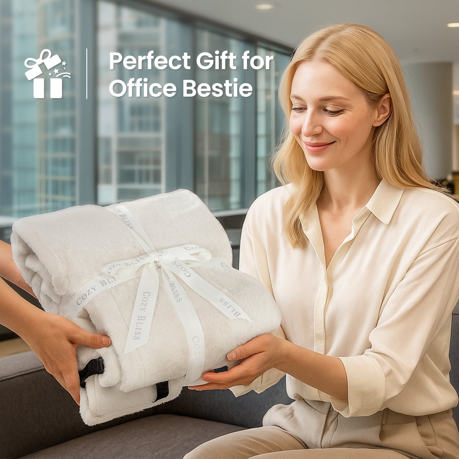 Woman receiving a folded blanket as a gift in an office setting #color_Beige
