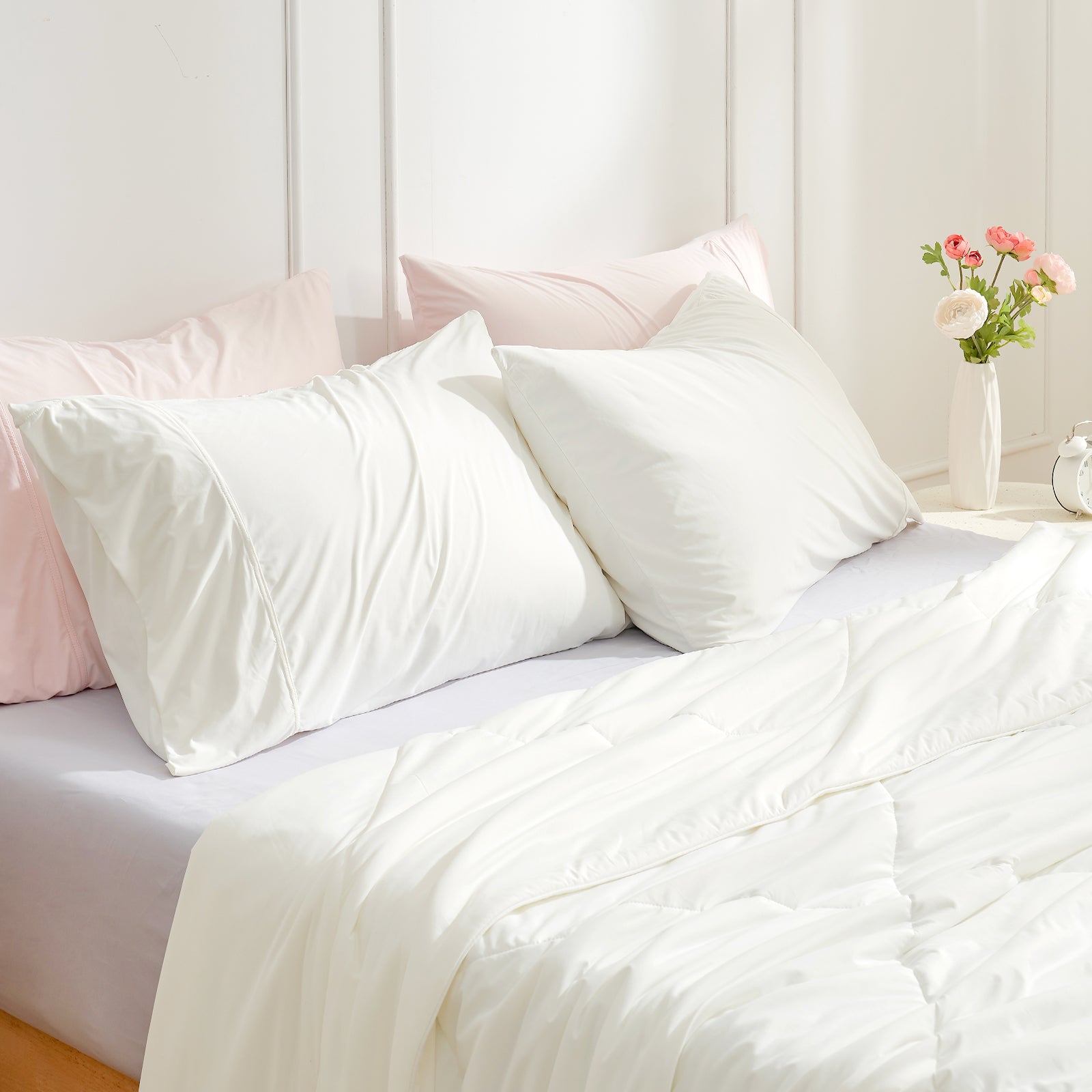 White cooling pillowcases on a bed #color_Off White