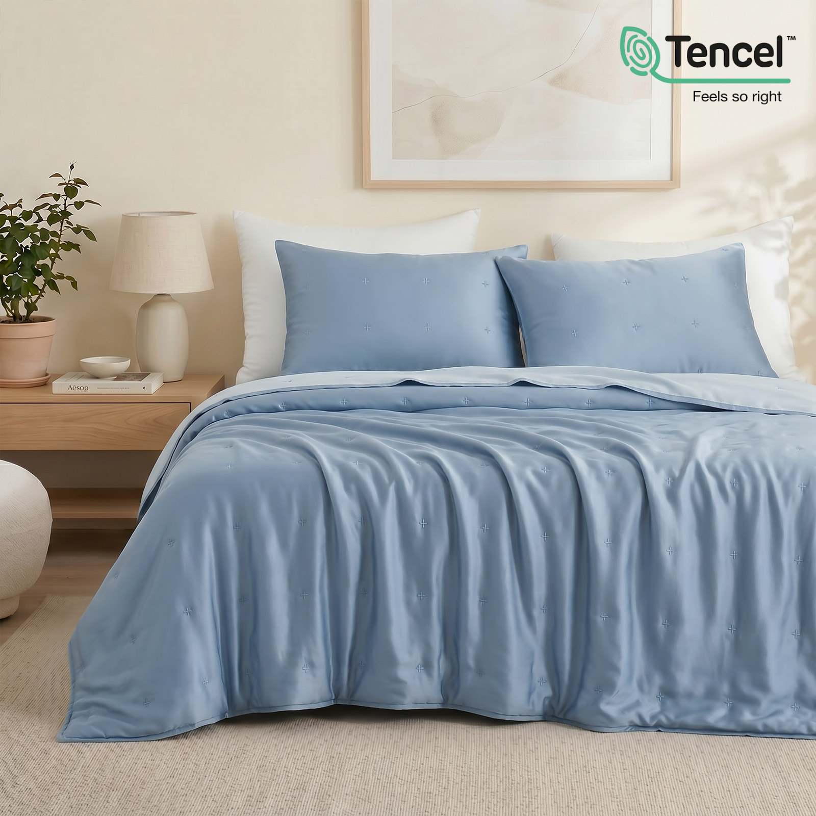Cozy Bliss Luxurious Tencel™ Lyocell Cooling Comforter in white front view.#Color_Dark Blue