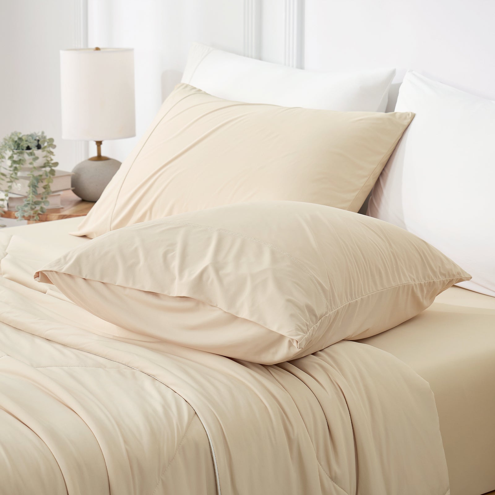 Khaki cooling pillowcases on bed, showcasing smooth, breathable fabric for summer comfort. #color_Khaki
