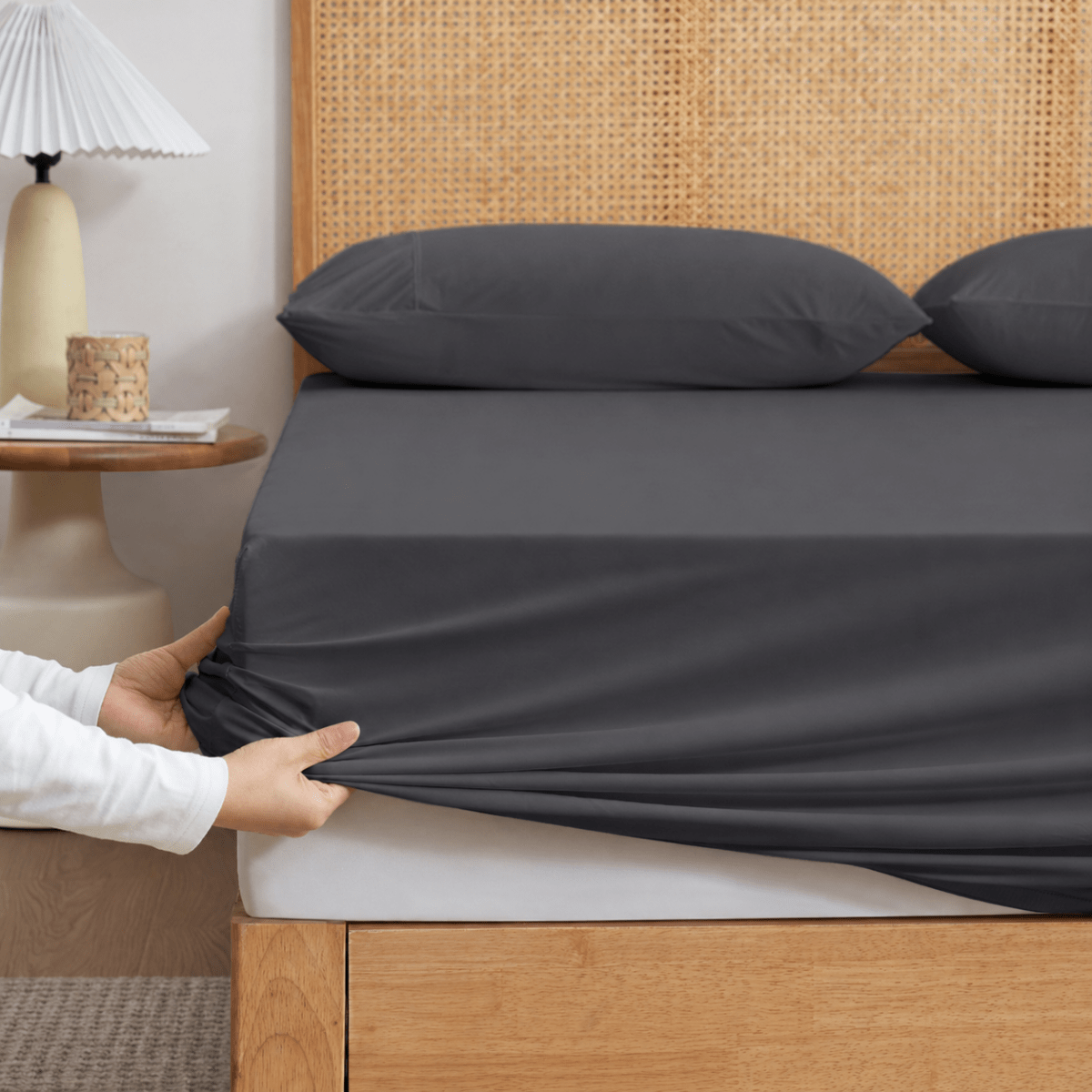 Cozy Bliss Grey-colored cooling fitted sheet set with pillowcases front view. #Color_Charcoal Grey