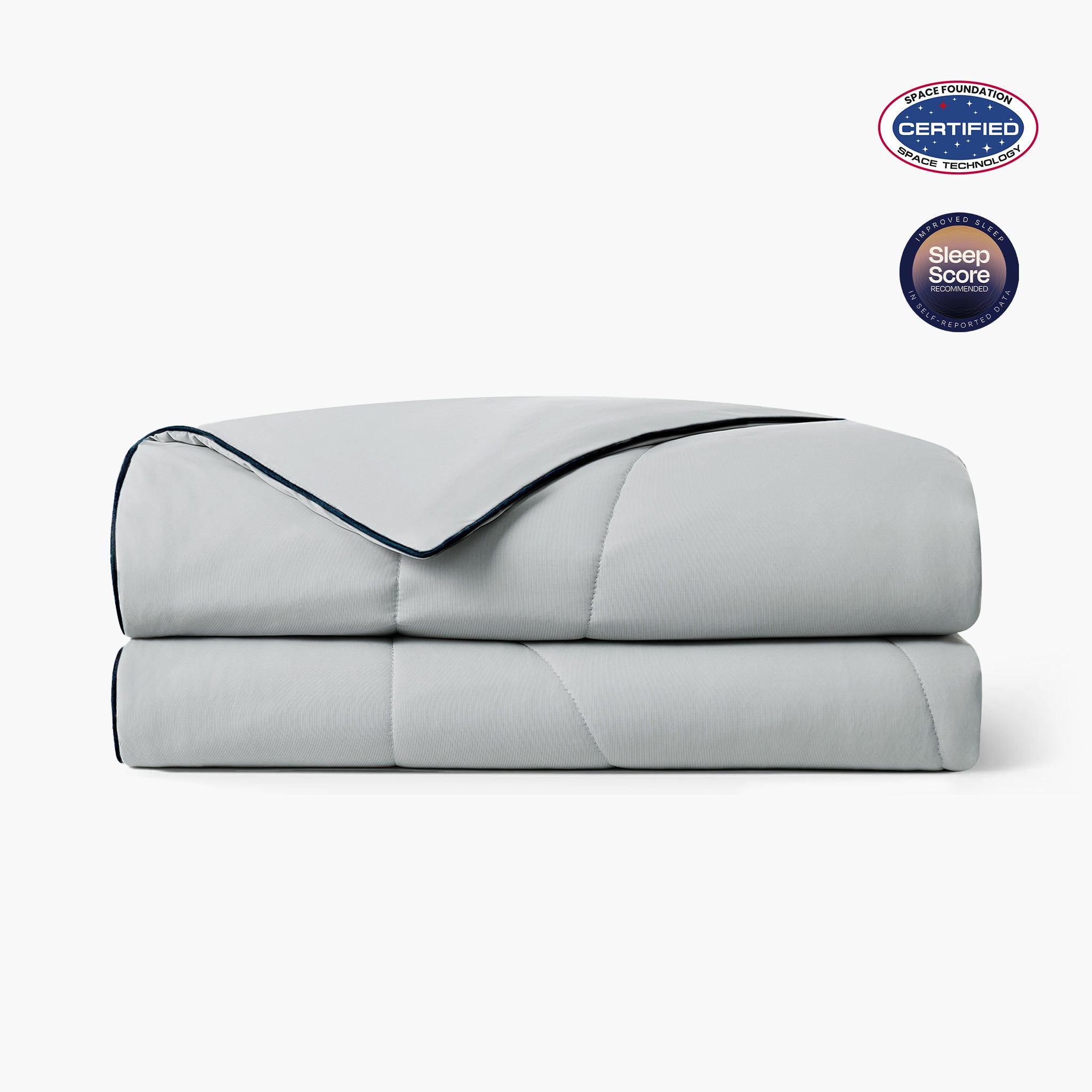 Folded gray cooling comforter with Space Foundation and Sleep Score certification logo on a white background#color_Cool Grey