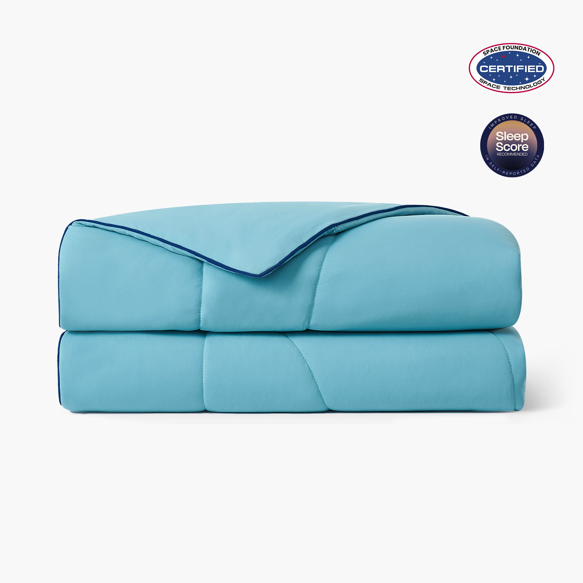 Folded dream blue cooling comforter with Space Foundation and Sleep Score certification logo on a white background#color_Dream Blue