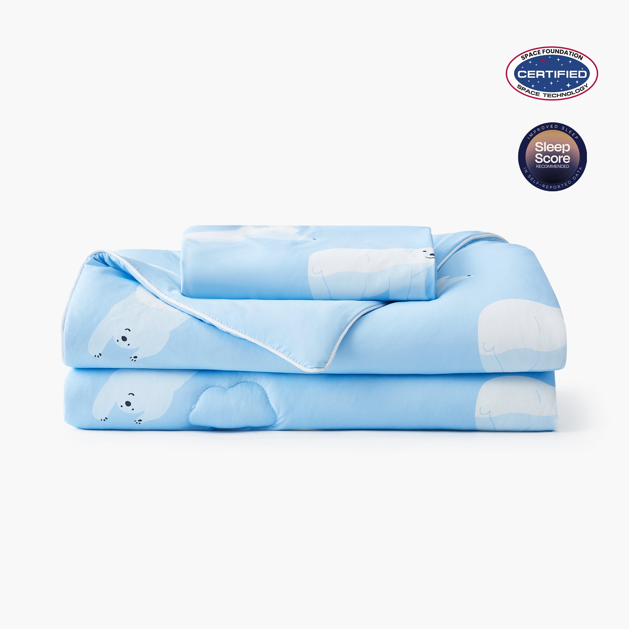 Folded Blue cooling comforter with bear pattern on a white background, featuring Space Foundation and Sleep Score certification.#color_Polar Bear